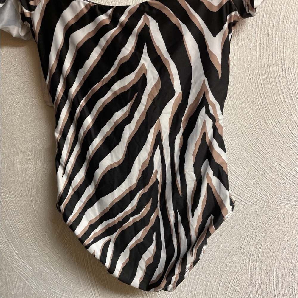 Trina Turk Black and White Asymmetrical Short Sleeve Blouse
